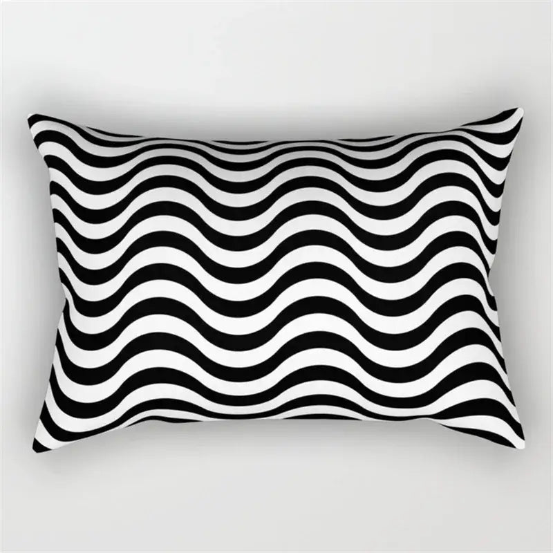 Rectangular pillow with bold black and white geometric wave line stripes for bedroom decor