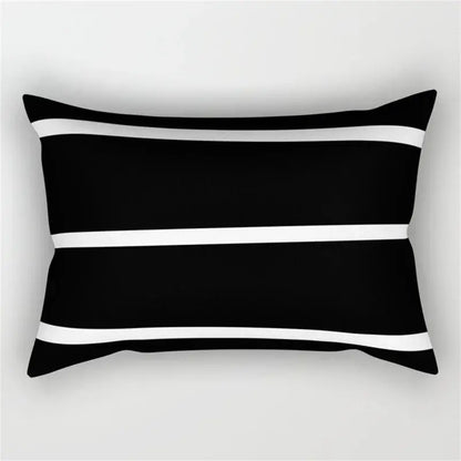 Black rectangular pillow with three horizontal white stripes featuring geometric wave line design for bedroom decor