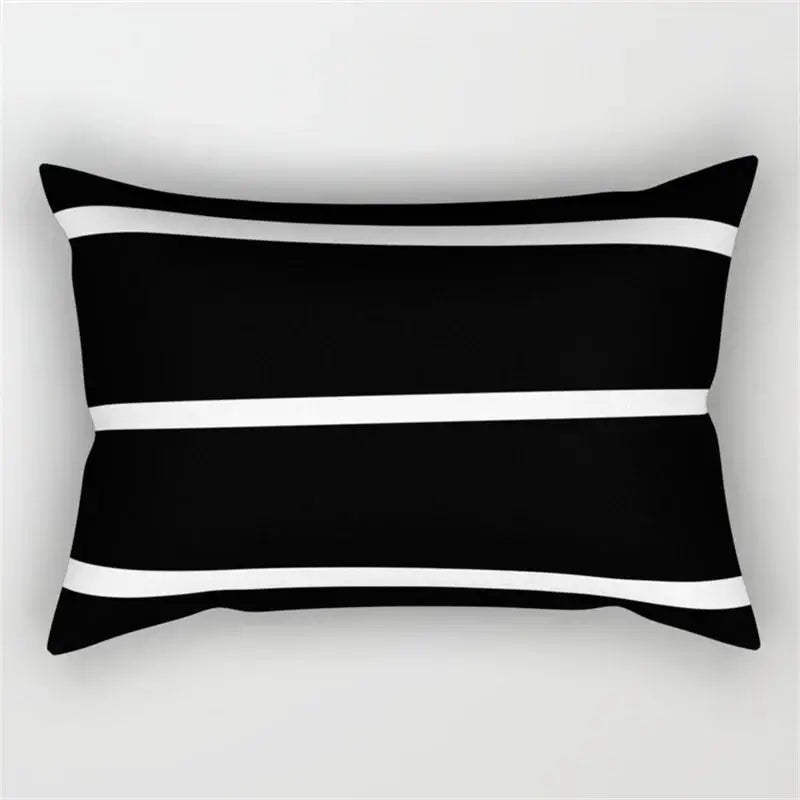 Black rectangular pillow with three horizontal white stripes featuring geometric wave line design for bedroom decor