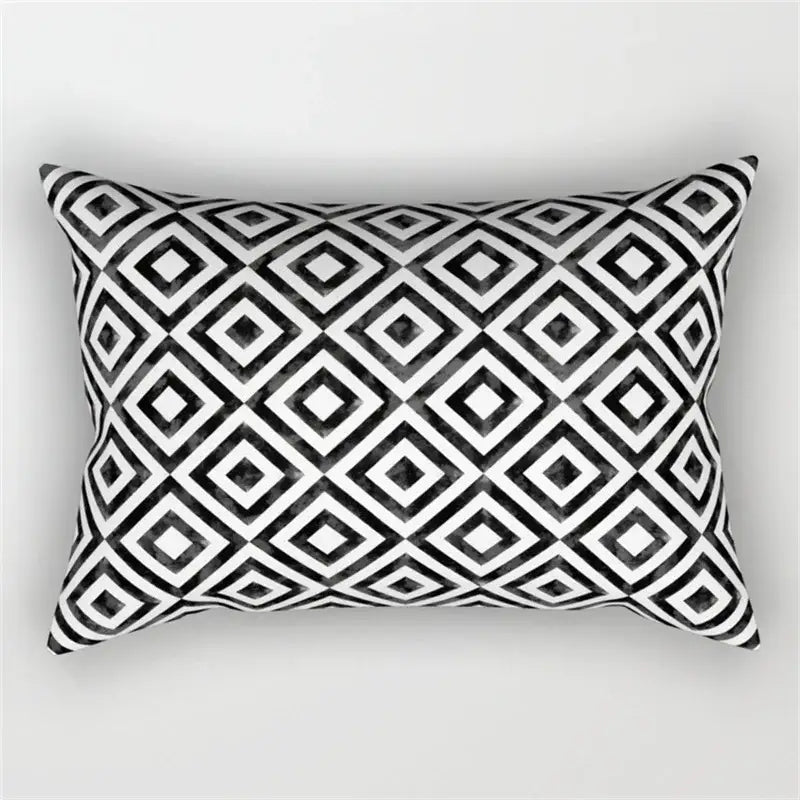 Rectangular pillow with bold black and white geometric wave line diamond pattern for bedroom decor