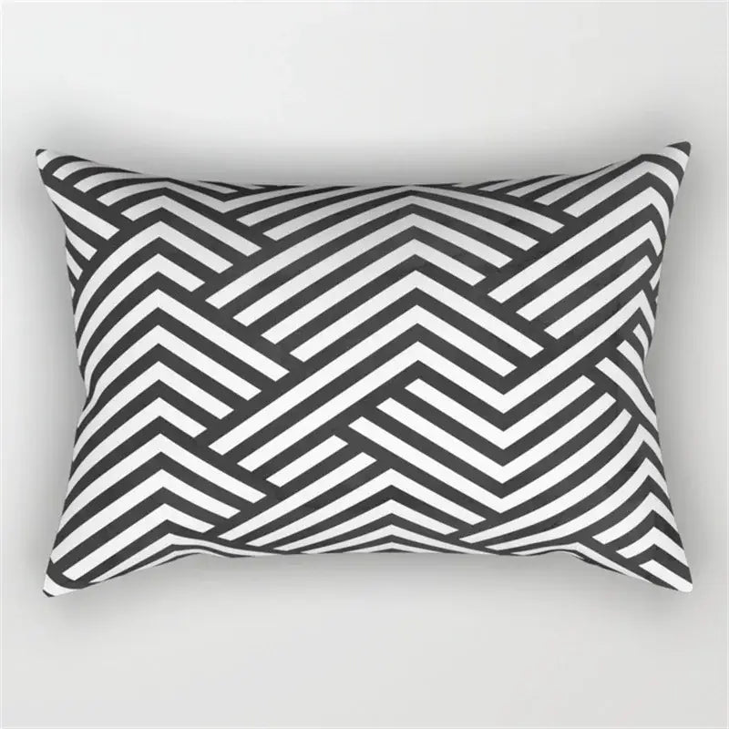 Rectangular pillow with bold black and white geometric wave line chevron pattern for bedroom decor