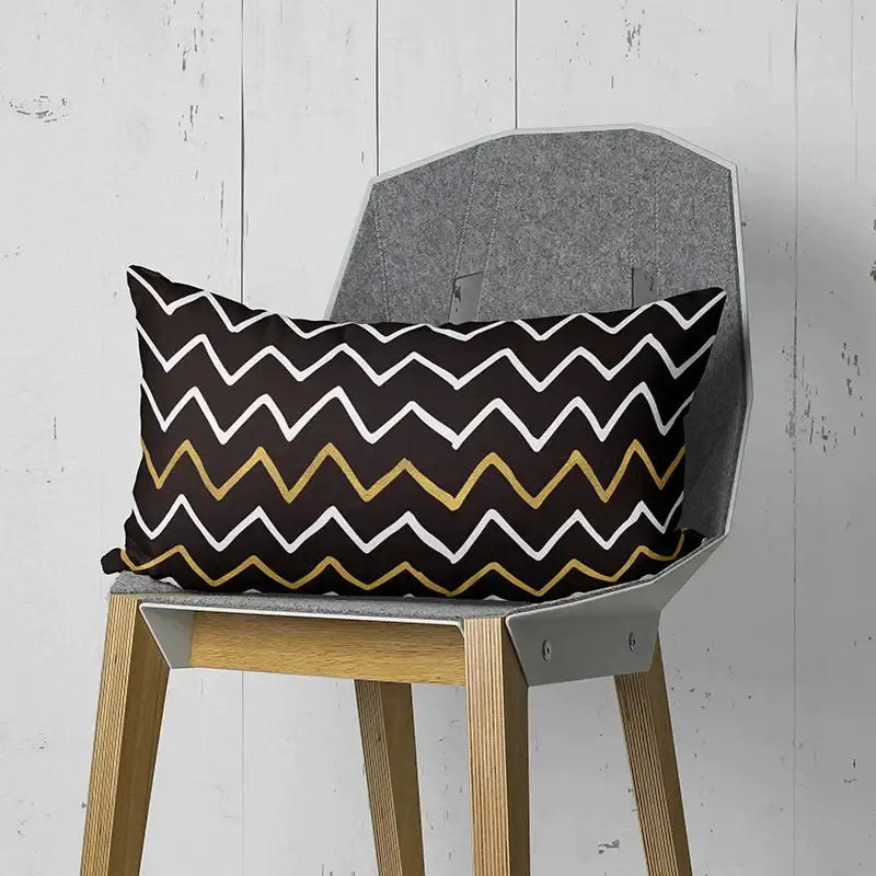 Black rectangular pillow with bold white and gold geometric wave line pattern for bedroom decor