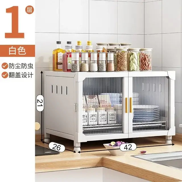 White kitchen cupboard storage rack with mesh doors and gold handles designed for dust-proofing and insect repelling