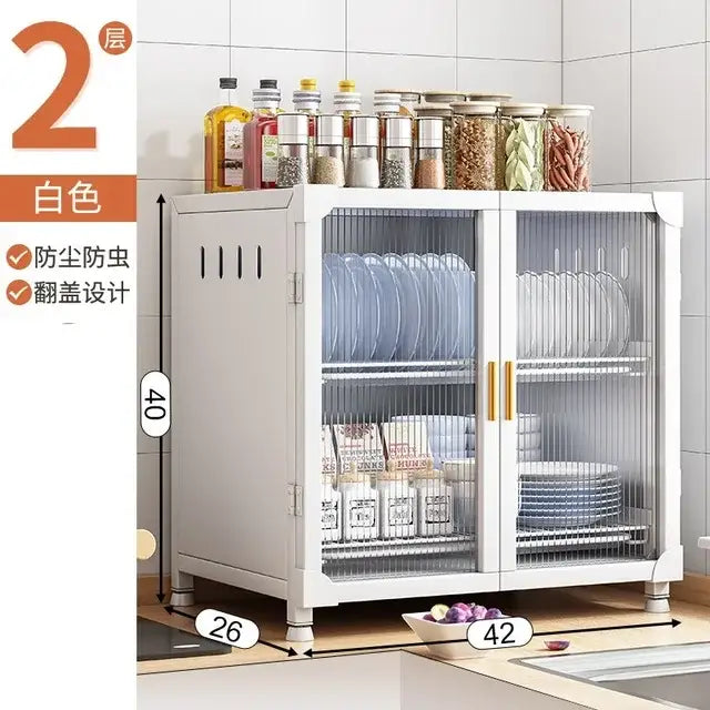 White two-tier decorbites kitchen cupboard storage rack with transparent glass doors, gold handles, and mesh ventilation