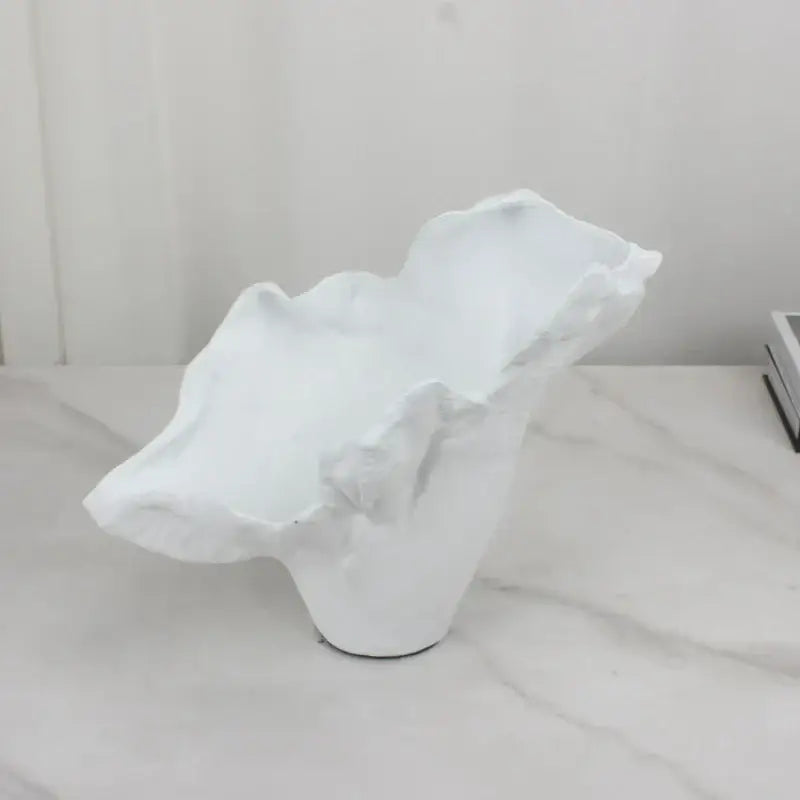 White ceramic irregular resin flower vase with organic flowing contours and textured surface for decorbites decor