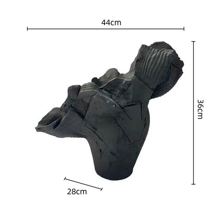Black abstract decorbites irregular resin flower vase sculpture with textured ribbed surfaces and irregular contours