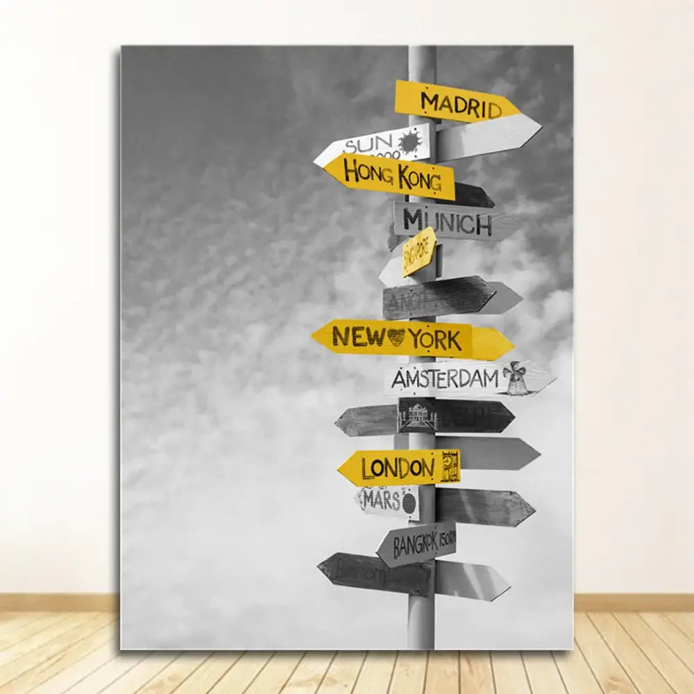 DecorBites black and white nordic landscape canvas set featuring a weathered wooden signpost with directional arrows