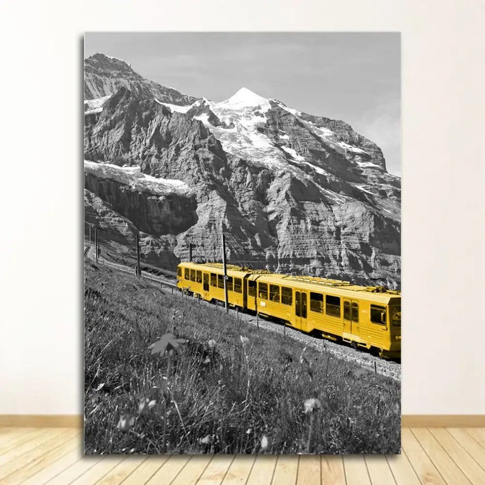Vibrant yellow train speeding through a rugged white nordic landscape featured in decorbites™ black and white nordic landscape canvas set