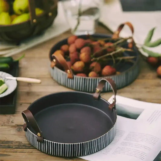 Black and white striped porcelain bowl with leather handle serving tray by decorbites for dining room use