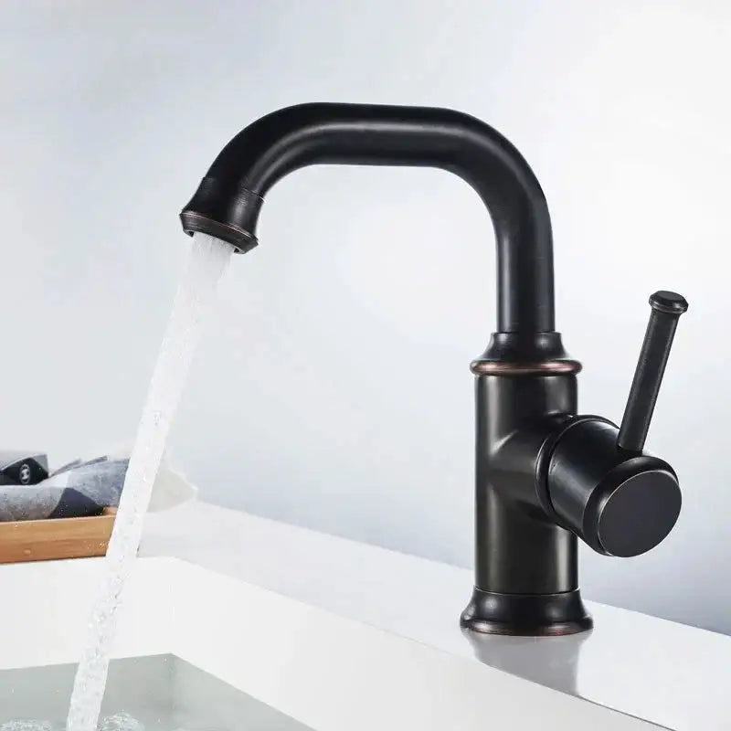 Black antique brass basin faucet with matte black finish and copper accents for kitchen mixer by decorbites