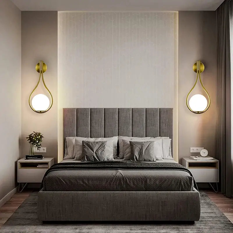 Gray upholstered bed featured alongside DecorBites™ black battery operated wall sconces with remote and usb type-c charging