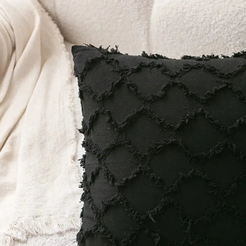 Black boho lumbar pillow cover with textured frayed diamond pattern for bedroom woven decor by decorbites