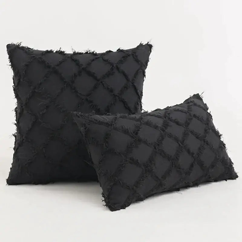 Black boho lumbar pillow cover with a textured diamond pattern and frayed edges for decorbites black boho decor