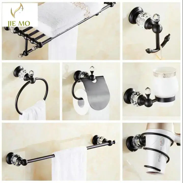 Black brass bathroom accessories set with crystal accents featuring black metal hardware for elegant bathroom decor