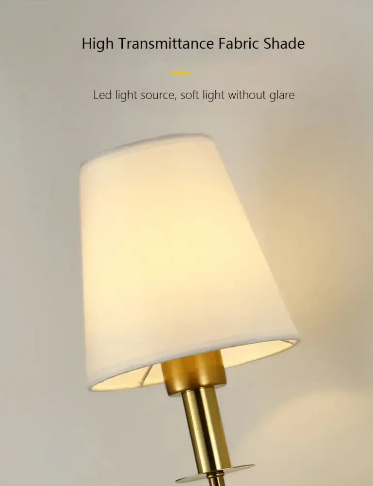 Black brass fabric shade wall sconce with white high transmittance fabric and gold metal stem for bedroom lighting