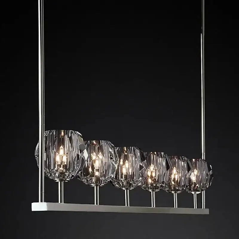Modern black bronze copper chandelier lights with five faceted glass shades and polished chrome rods for kitchen island decorbites