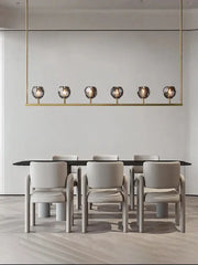 Gold-toned linear pendant chandelier lights with six spherical glass bulbs by decorbites black bronze copper for dining room