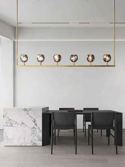 Gold-toned linear pendant chandelier lights with six faceted glass globes black bronze copper decorbites for kitchen island