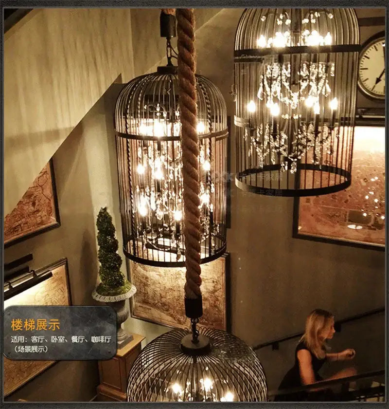 Black wrought iron birdcage crystal chandelier with bronze accents and thick rope suspension for dining room decorbites iron birdcage