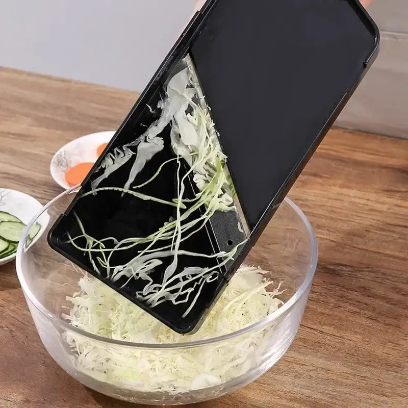 Black cabbage grater and shredder kitchen slicer with sleek matte finish and sharp edges by decorbites cabbage grater