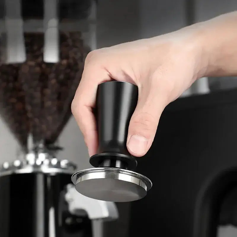 Black calibrated stainless steel espresso tamper set with cylindrical handle and flat base for decorbites espresso tamper use
