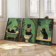 DecorBites™ 3-piece wall art set featuring black cat bathroom prints with whimsical scenes on green background