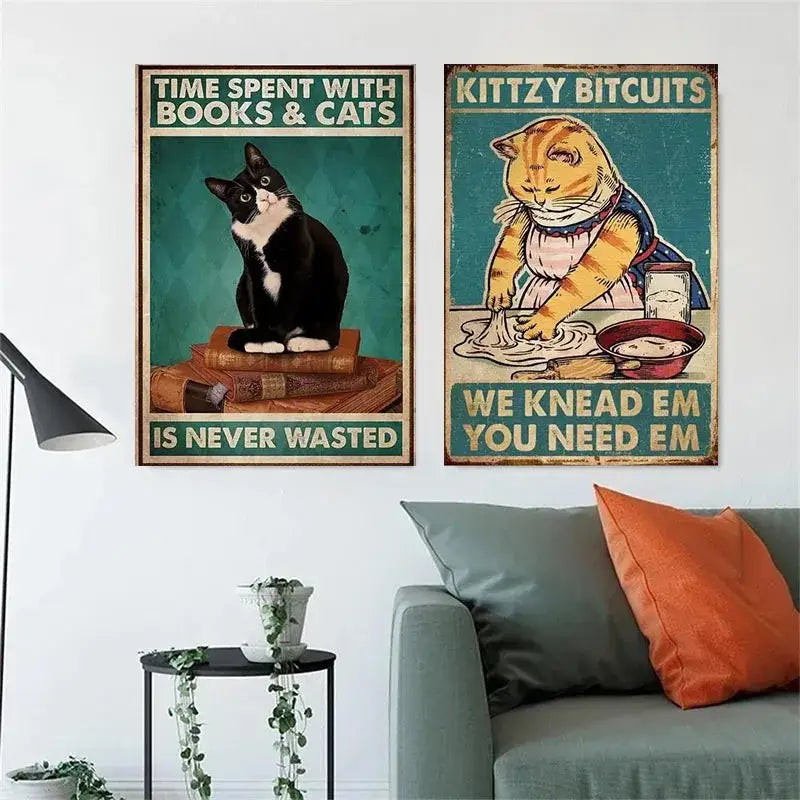 Two framed vintage style posters featuring a black cat reading atop books and an orange tabby cat kneading dough for home decor