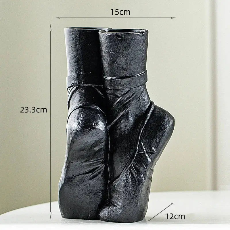 Black ceramic ballet shoes vase shaped like pointe shoes ideal for bedroom decor and elegant display
