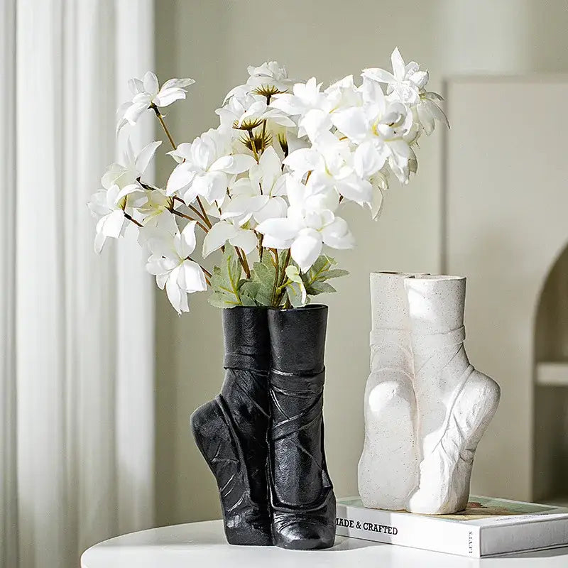 Black ceramic ballet shoes vase shaped like a pair of shoes for bedroom decor use