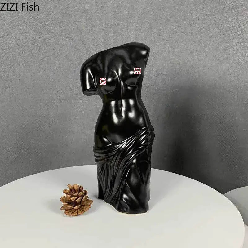 Black glossy resin human body figurine bust styled after venus de milo with draped fabric for decorbites living room decor