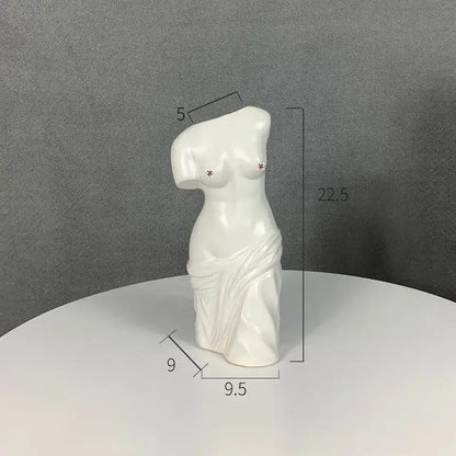 White ceramic human body figurine bust with draped fabric and decorative studs for decorbites living room decor