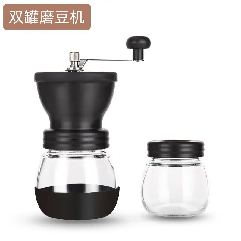 Black ceramic hand rocking coffee grinder with double chamber and clear glass base for manual mill use