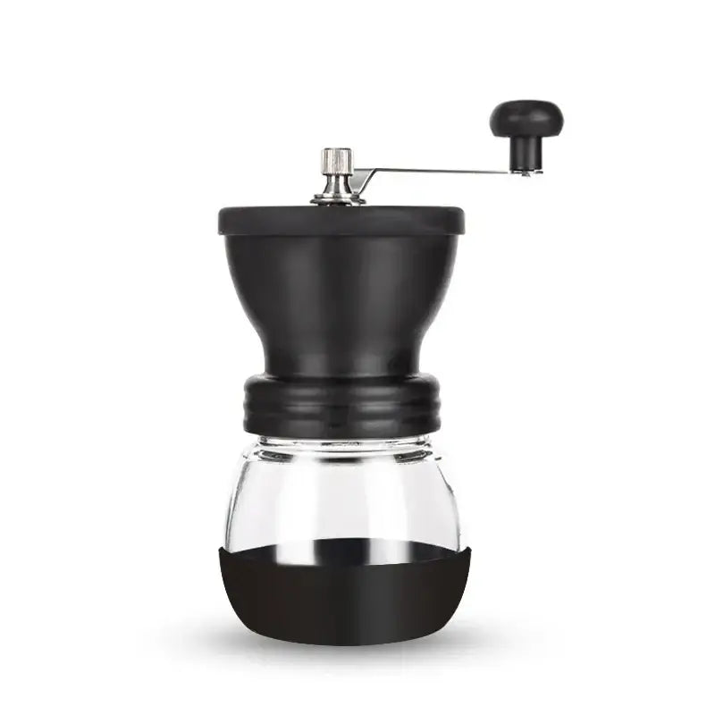 Black ceramic hand rocking coffee grinder with glass collection bowl and metallic handle for manual kitchen use