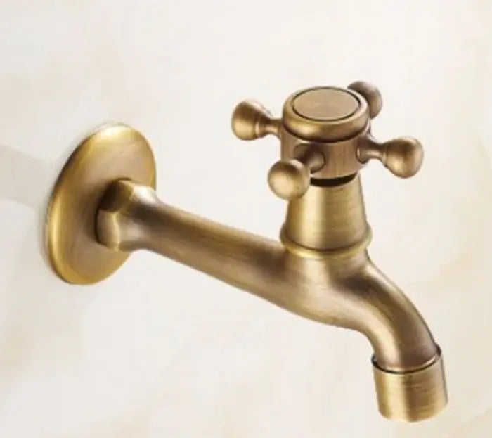 Antique brass-finished wall-mounted faucet with cross handle and rounded spout for brass body round shower decorbites