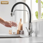 Black & chrome kitchen faucet with white ceramic handle and black flexible spout by xoxo for decorbites black deck use