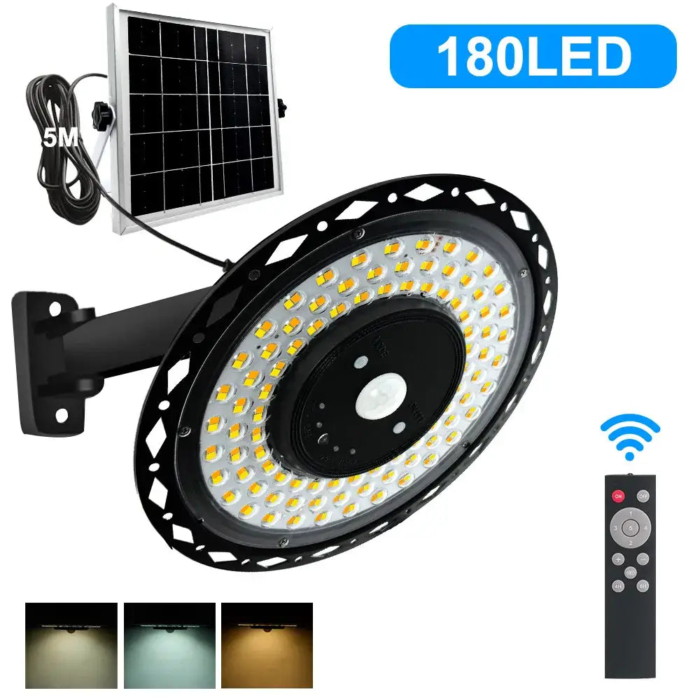 Black circular 180led solar shed light with bright yellow leds mounted on adjustable bracket with remote garage fixture