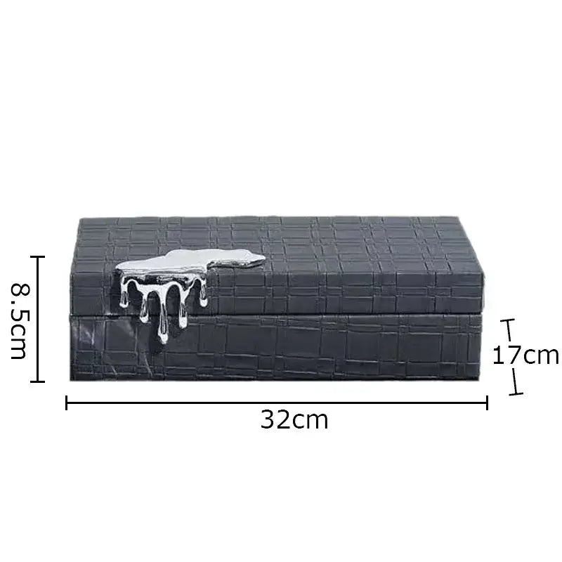 Black crocodile leather jewelry box with silver melting-effect clasp for elegant bedroom storage