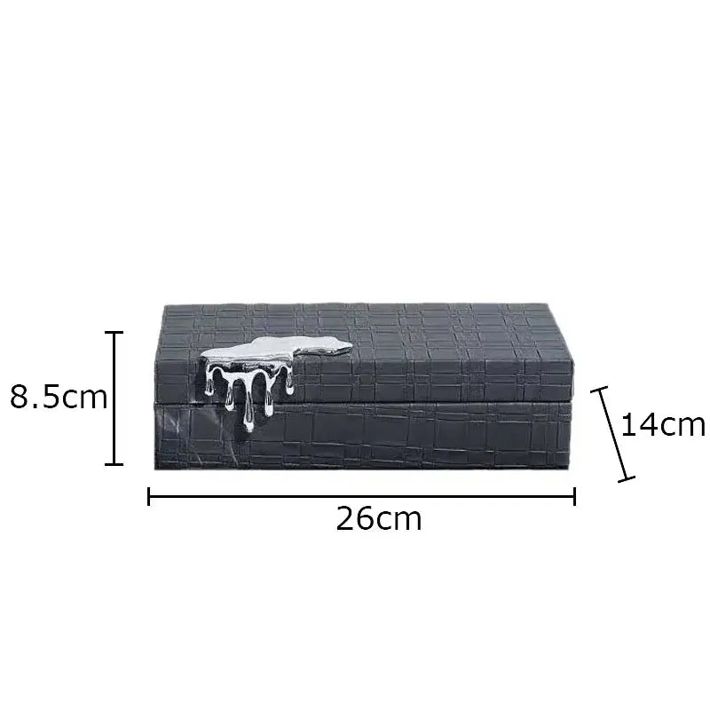Black crocodile leather jewelry box with textured pattern and silver metallic drip lid for bedroom storage