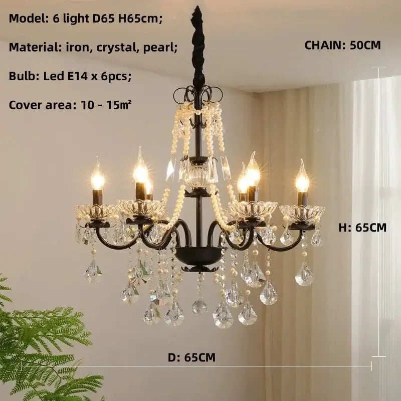 Black crystal chandelier with pearls featuring black iron frame crystal and pearl accents six lit led bulbs decorbites black crystal