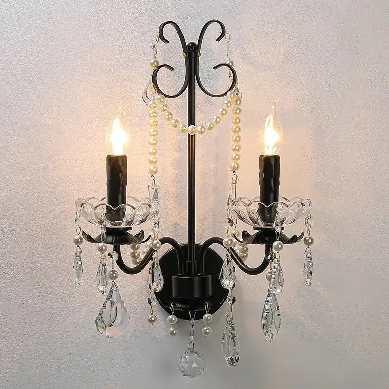 Black crystal chandelier black wrought iron wall sconce with two candle lights crystal droplets and pearl strands