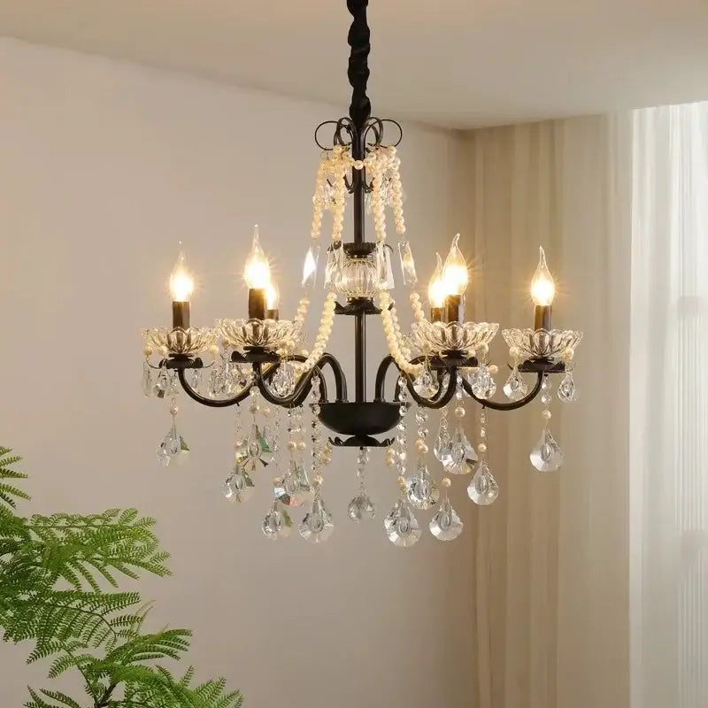 Black crystal chandelier with pearls featuring black wrought iron frame and crystal droplets for elegant foyer decorbites black crystal lighting