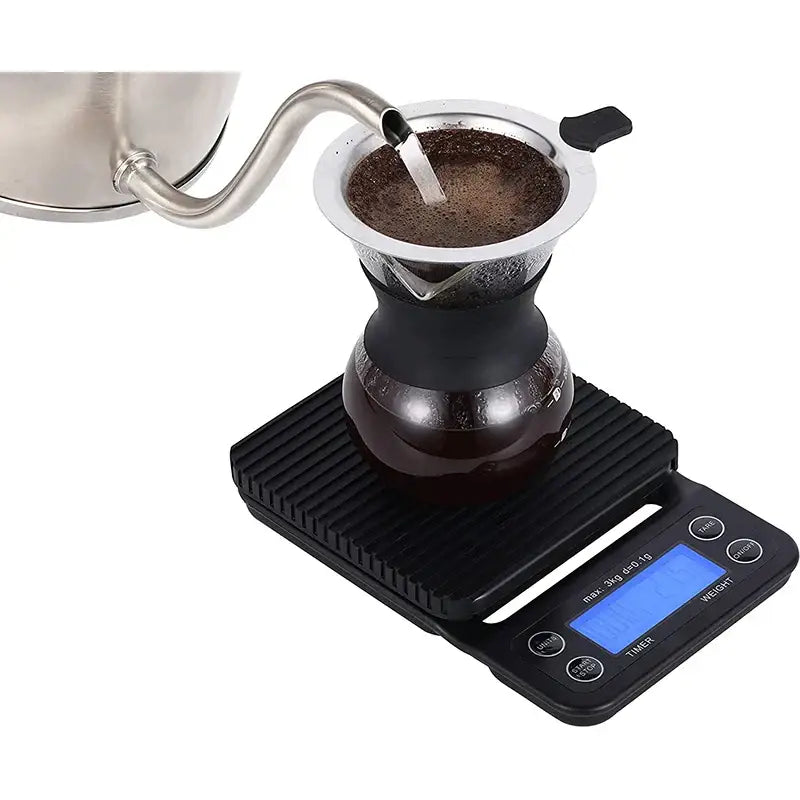 Black digital brewmaster coffee scale timer with blue display and ribbed platform for precise brewing measurements