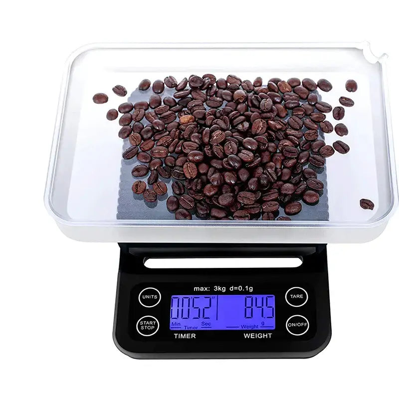 Black digital brewmaster coffee scale timer with transparent ribbed platform weighing roasted coffee beans decorbites brewmaster coffee