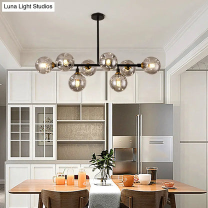 مصباح معلق على شكل كرة زجاجية سوداء من DecorBites™ لجزيرة غرفة الطعام الحديثة