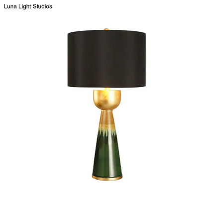 Black Fabric Nightstand Lamp with Traditional Urn Base - 1-Head Drum Table Light