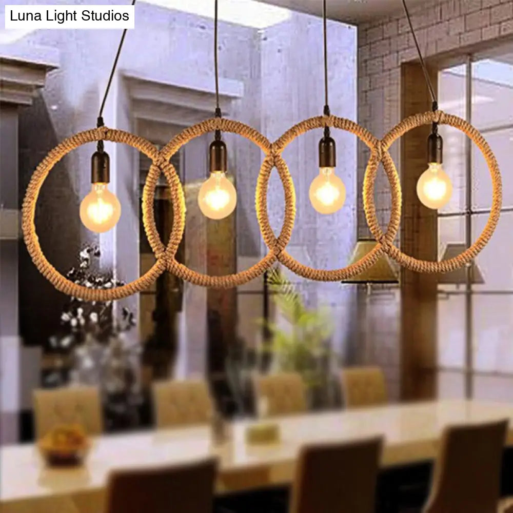 Black Finish Lodge Style Four-Ring Pendant Light with Manila Rope - 4 Lights for Coffee Shop