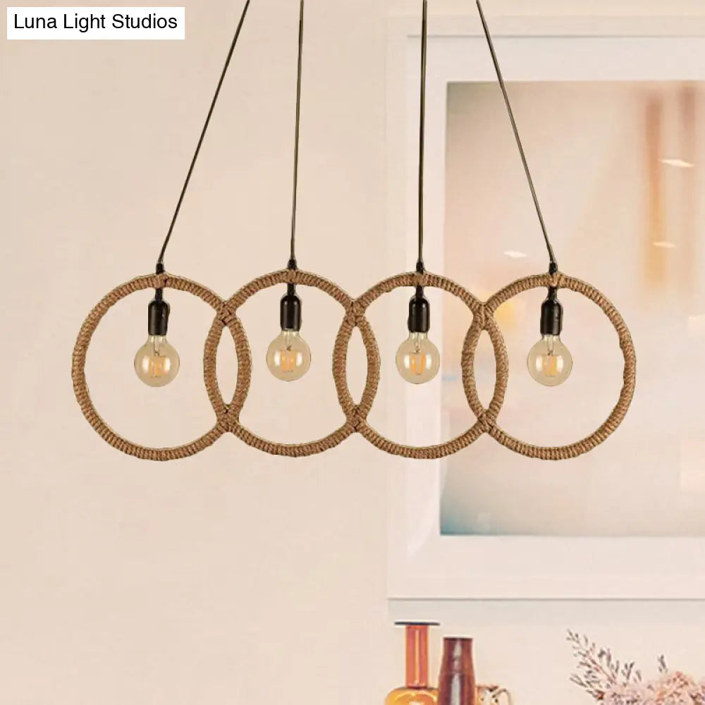 Black Finish Lodge Style Four-Ring Pendant Light with Manila Rope - 4 Lights for Coffee Shop