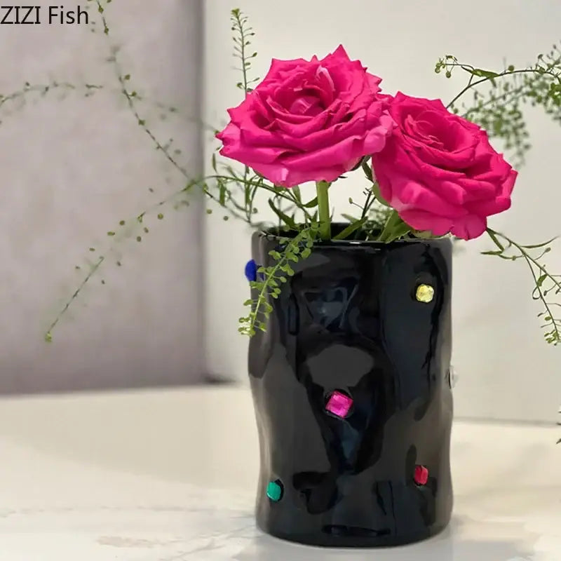 Black gemstone ceramic vase with colorful gemstone accents holding vibrant pink roses for bedroom desk decorbites gemstone ceramic