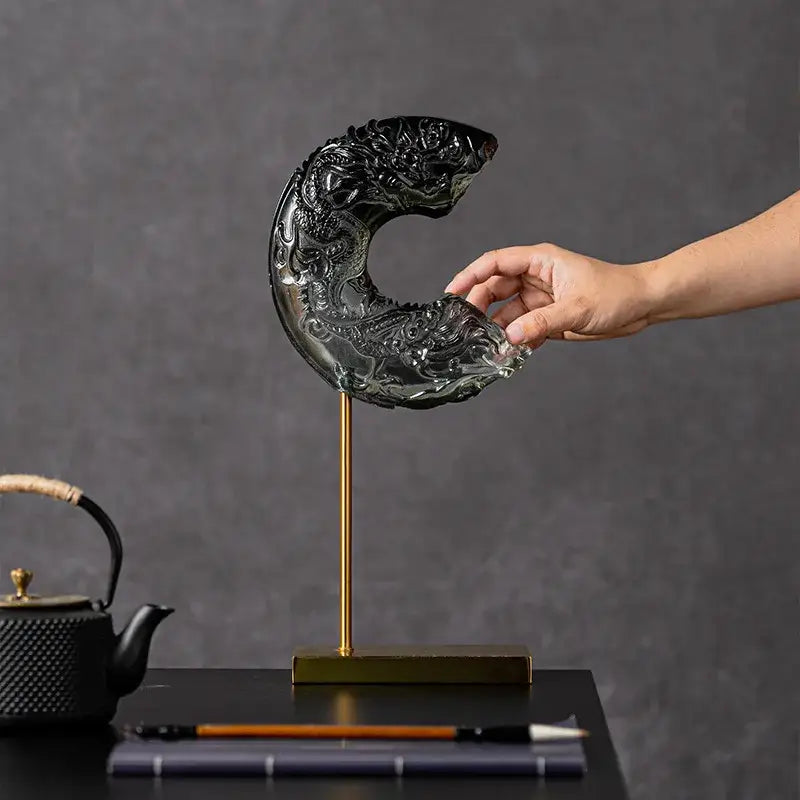 Black glass dragon sculpture decorbites crescent moon on gold stand featuring intricate carvings for living room decor