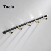 Black gold metal wall mounted robe rack with five hooks for towel storage by decorbites brass